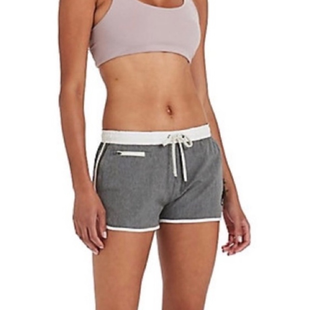 Vuori Athletic Gray and White Shorts with Dolphin Hem